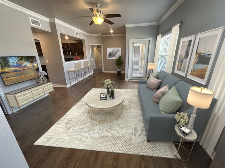 relax at Willow Creek in this spacious living room - Willow Creek Apartments