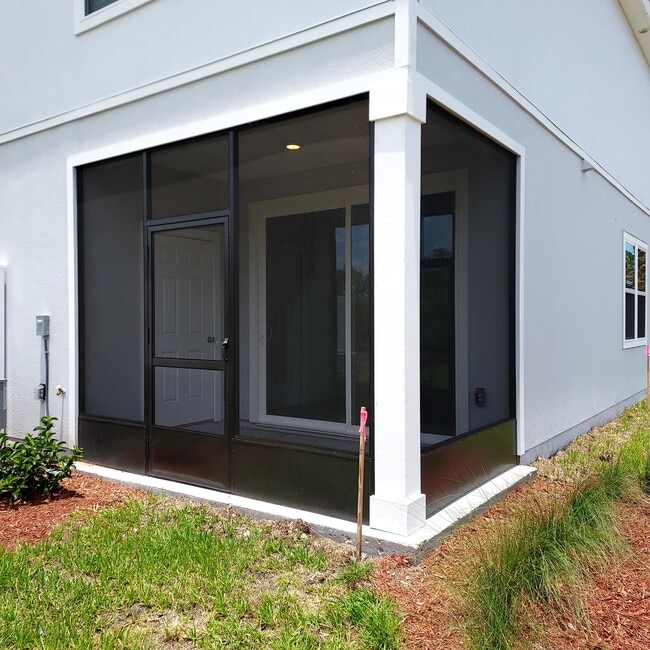 Screened in Lanai - outside view - 67 Sage Branch St