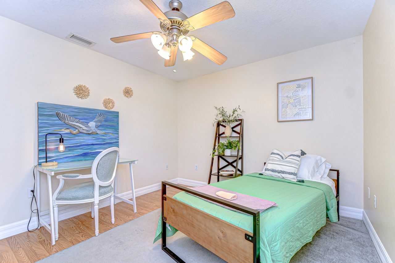 guest bedroom comes with a twin bed and a dedicated work space - 5114 33rd St E