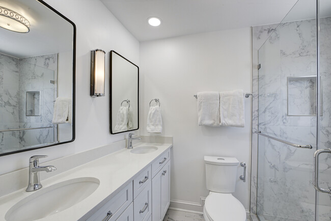 Primary Bathroom: remodeled bathroom in 2019; double vanity. - 3227 45th St NW