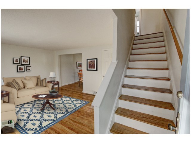 Adams Park townhomes feature hardwood floors *Virtually staged - Adams Park Apartments