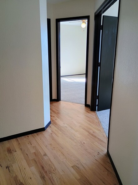 Hall to bedrooms - 10360 E Jewell Ave