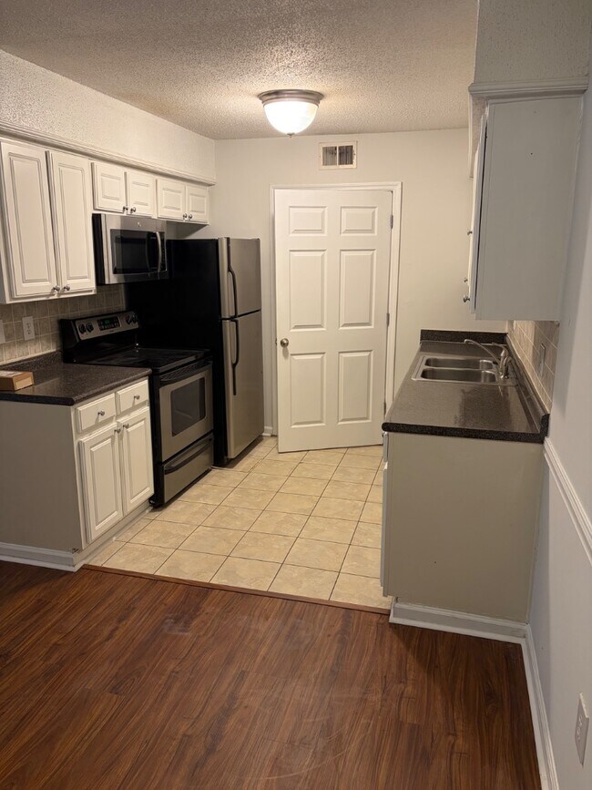 Building Photo - 1402 Camp Rd