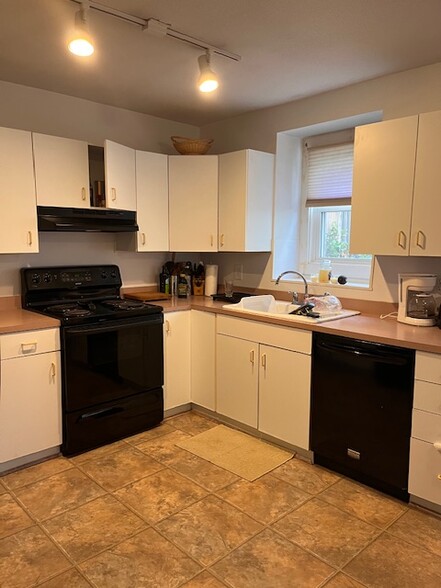 kitchen with new stove and dishwasher - 103 Alder Rd