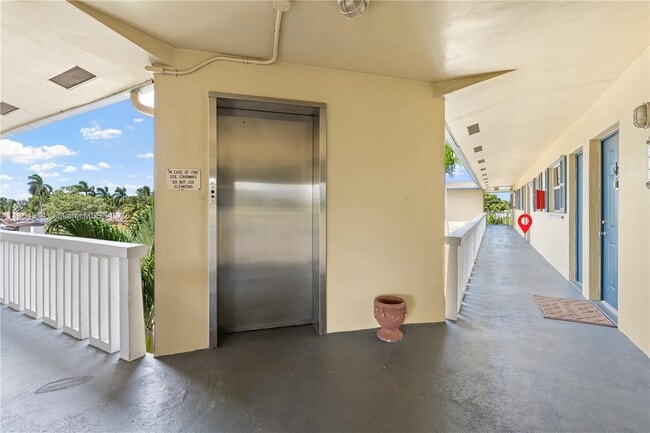 Building Photo - 1400 NE 57th Ct