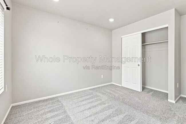 Building Photo - 12231 W 57th Dr