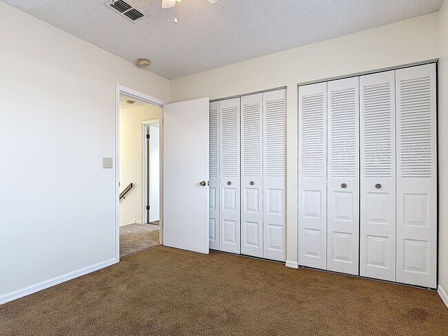 Building Photo - Spanish-Style 3 Bedroom, 2.5 Bath Mediterranean Rooftop Townhouse – Basic Cable & Wi-Fi Included!