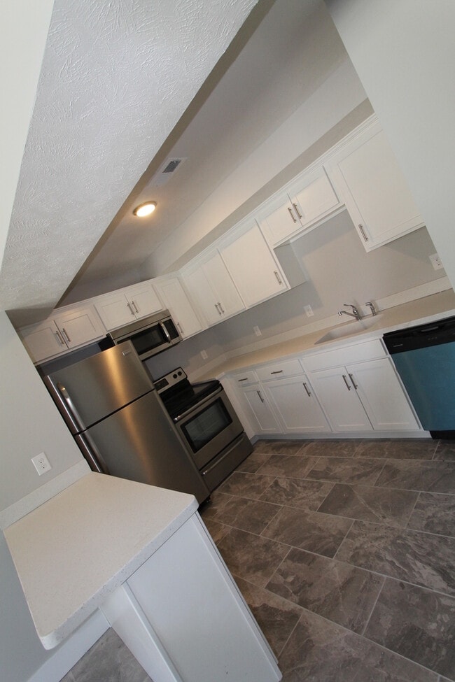 Building Photo - Modern One Bedroom Duplex at the Cottages -- A must-see!.