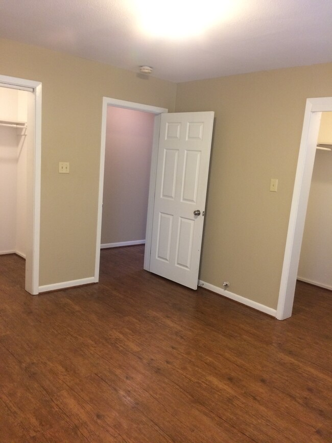 Bedroom door, closets on both sides - 213 Mitchell St