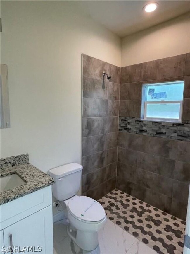 Building Photo - Available Now Three Bedroom 2 bath/ Single...