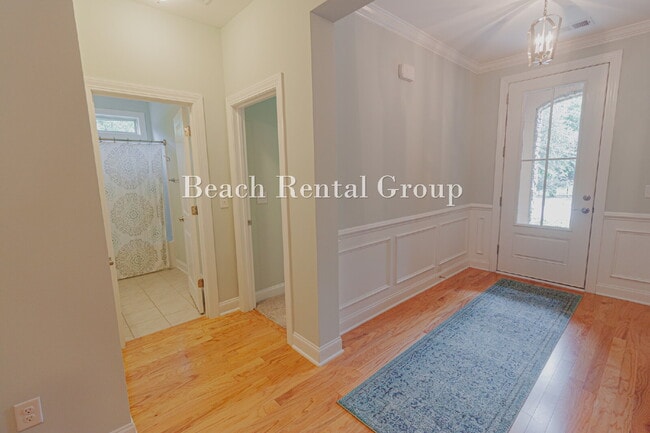 Building Photo - Fully Furnished Corner Lot with Screened Patio