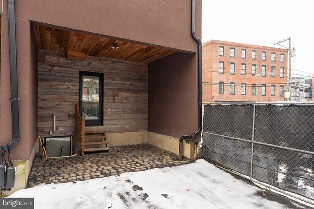 Parking in the back. Partially covered for one car. A second car can be parked on this lot, too! - 1005 New Market St