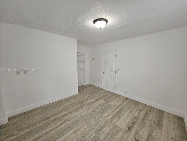 Building Photo - 118 NW 8th Ave