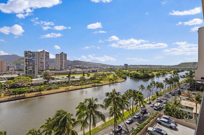 Building Photo - Wake Up to Stunning Mountain & Ala Wai Canal Views in the Heart of Waikiki