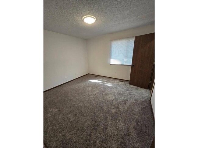 Building Photo - 6662 84th Ct N