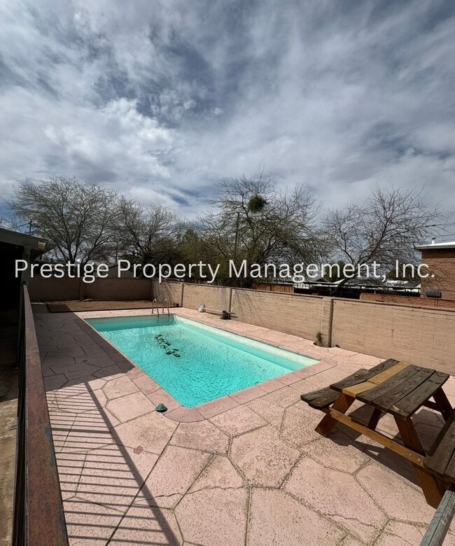 Building Photo - Stop Your Search! This 3/2+ Bonus Room is Centrally Located with a Pool and More!