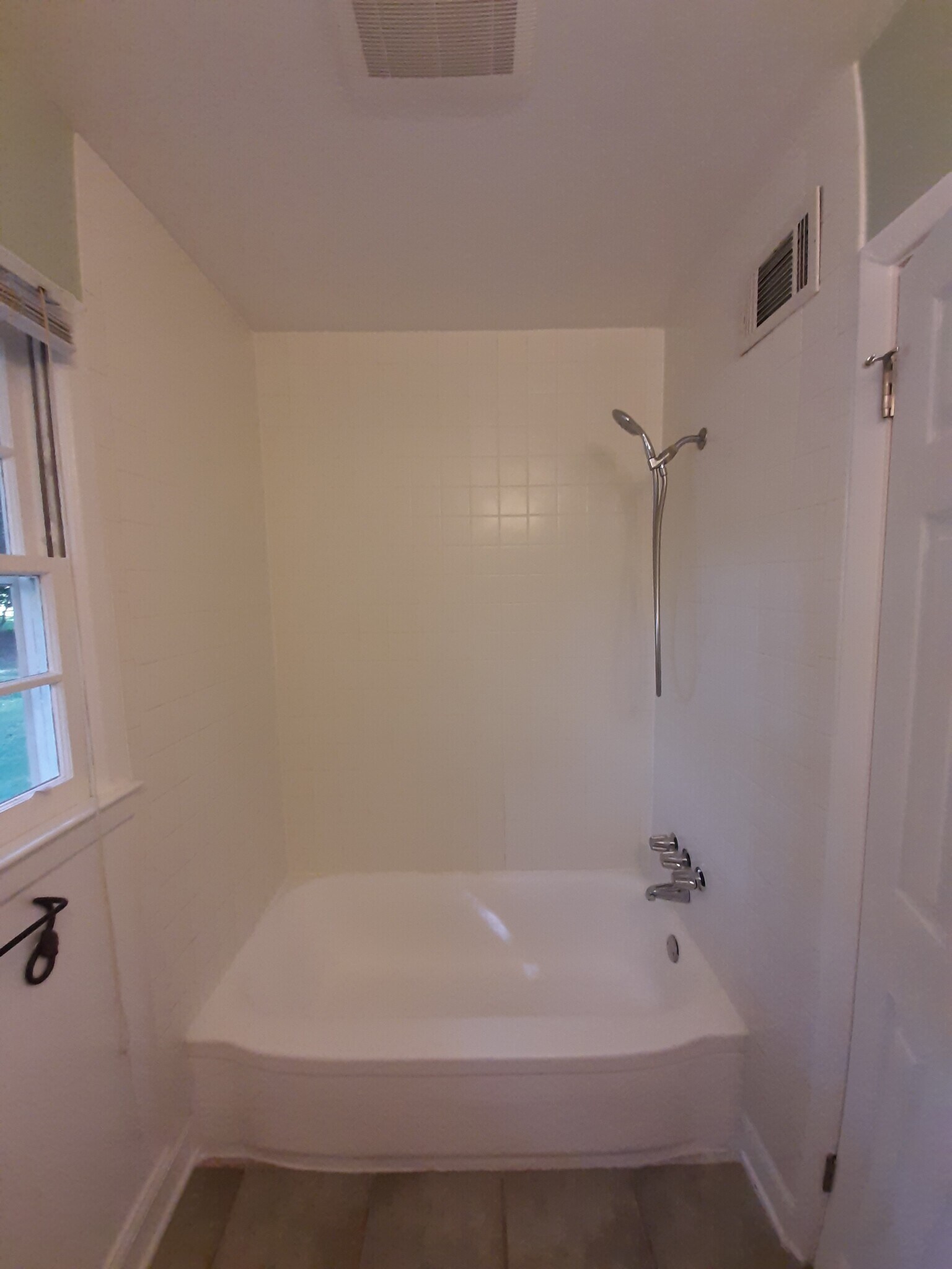There's a bathtub and shower, along with a fan connected to a condensation sensor to keep humidity in check. - 2955 Fantasy Ln