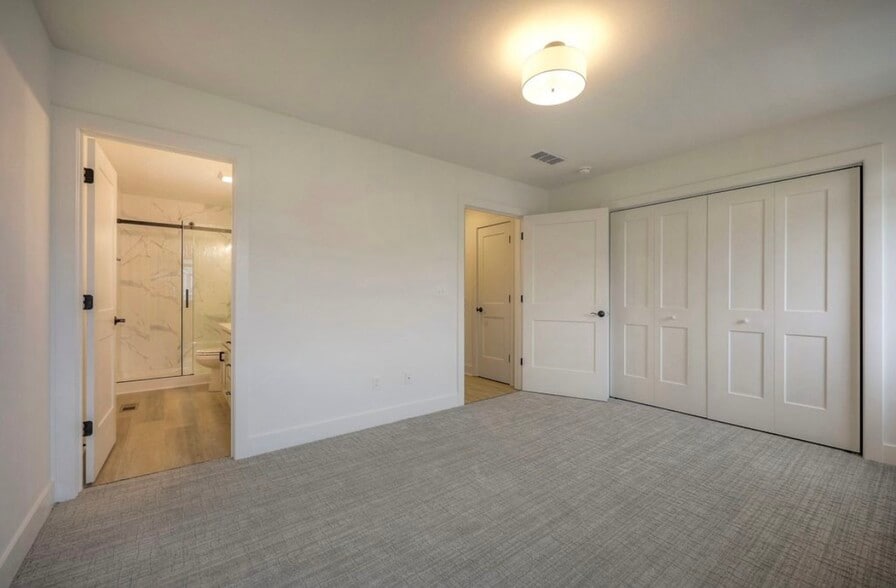 master bedroom and ensuit bathroom - 22907 W 72nd Ter