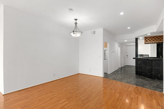 Living room, view 3 - dining nook, view of kitchen, entryway - 1745 S Bentley Ave