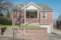 Building Photo - This home exudes a cheerful and welcoming charm!