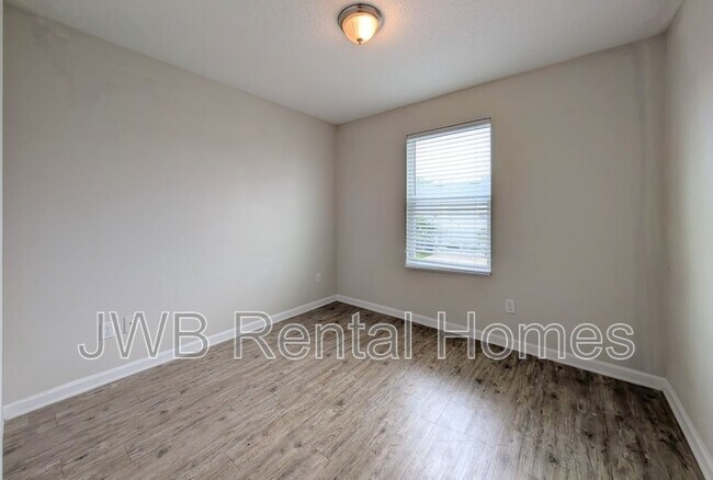 Building Photo - 8445 McGirts Village Ln