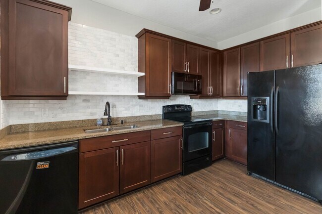 Building Photo - Beautiful Townhome with Private Courtyard & 2-Car Garage Near Lake Nona