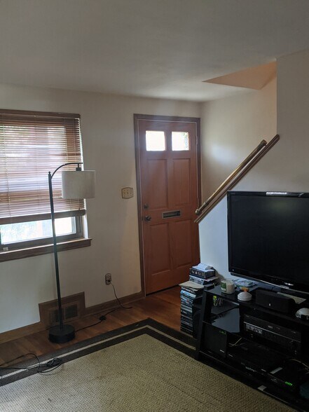 Living room heading upstairs - 189 Newman St