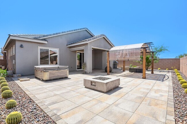 Building Photo - Stunning home with a serene Zen backyard, raised garden beds, fountain and spa!