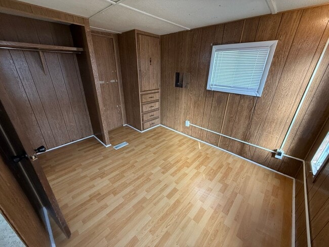 Building Photo - 2 Bedroom 1.5 Semi-Rural Mobile Home with Workshop on Large Lot