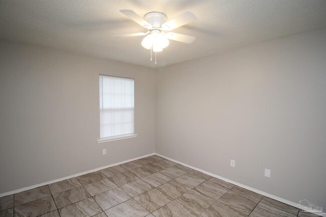 Building Photo - 6810 Tiki Ln