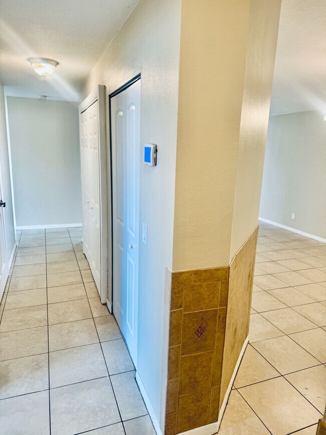 Building Photo - For Rent: Spacious 3-Bedroom, 2-Bath Second-Floor Condo with Balcony & Community Amenities