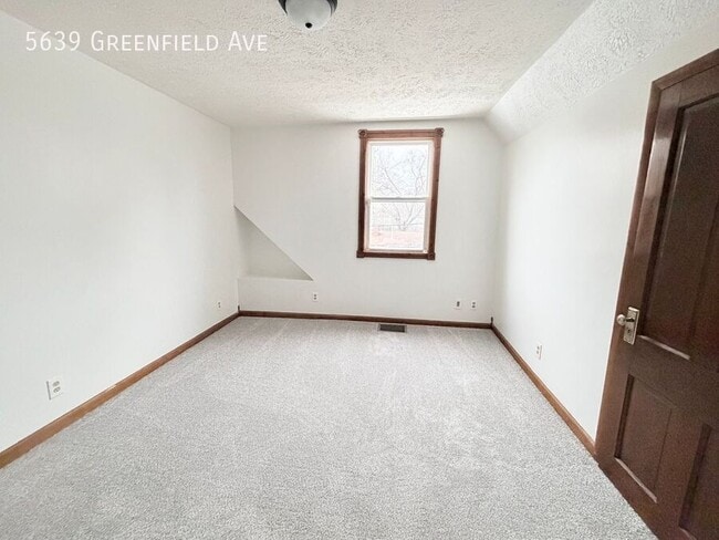 Building Photo - 5639 Greenfield Ave