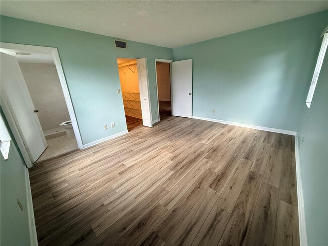 Building Photo - 7406 Woodmont Terrace