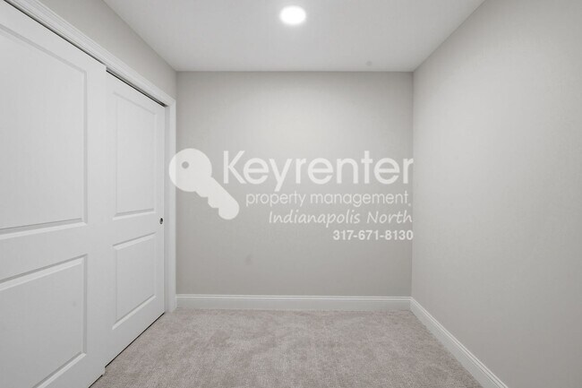 Building Photo - Located in Westfield, IN, this attractive 3-bedroom, 2.5-bath home sits on a corner lot within an...