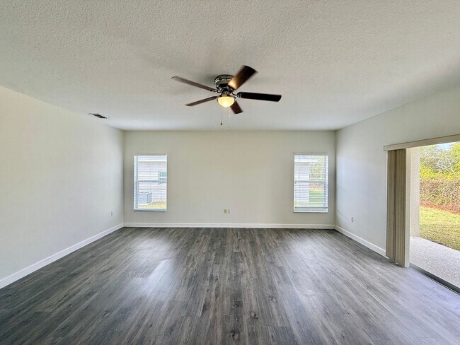Building Photo - GORGEOUS, Large Completely Renovated Two-Story 4/2.5 PLUS LOFT in POINCIANA VILLAGES!