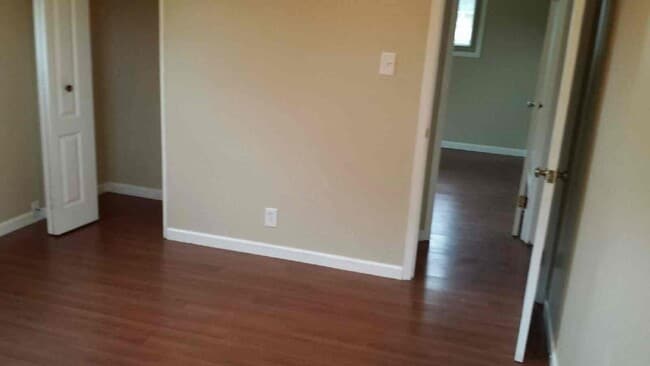 Building Photo - Three bedroom ranch with 2 car garage and large fenced in yard