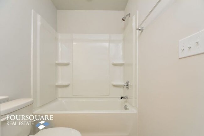 Building Photo - Modern 3-Story Townhome with First-Level B...