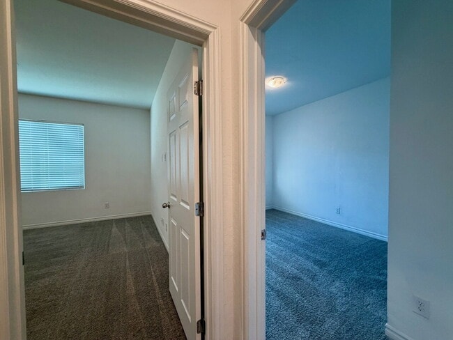Building Photo - GATED 3 BED 2.5 BATH TOWNHOME WITH 2-CAR GARAGE, COVERED PATIO & COMMUNITY POOL