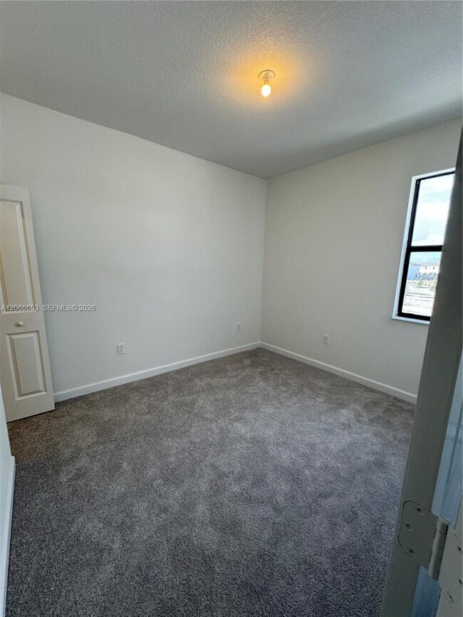 Building Photo - 23379 SW 128th Ave