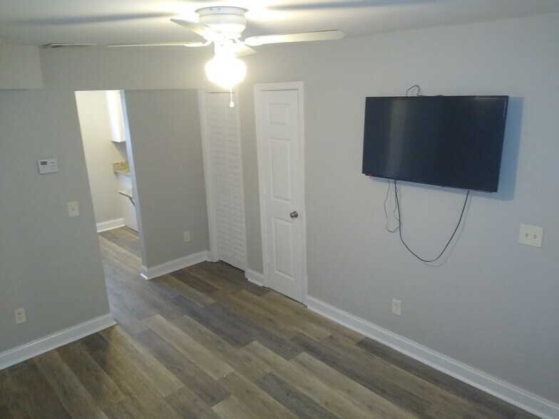 Living-room with TV - 710 North Ave NW