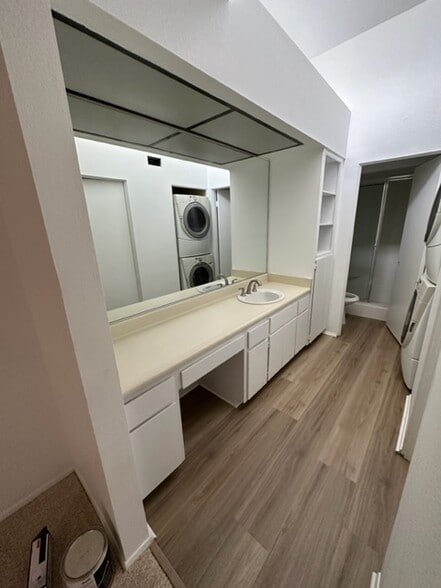 Second bathroom with linen storage - 255 E Avenida Granada