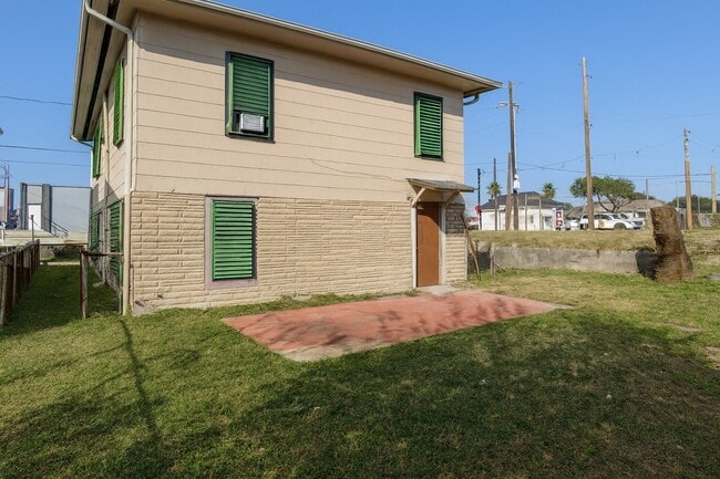 Building Photo - 6113 Ave Q 1/2