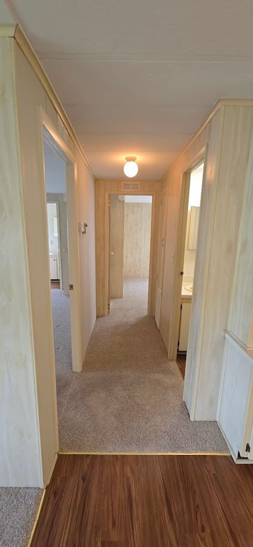 Building Photo - 2 bed 2 baths with carport