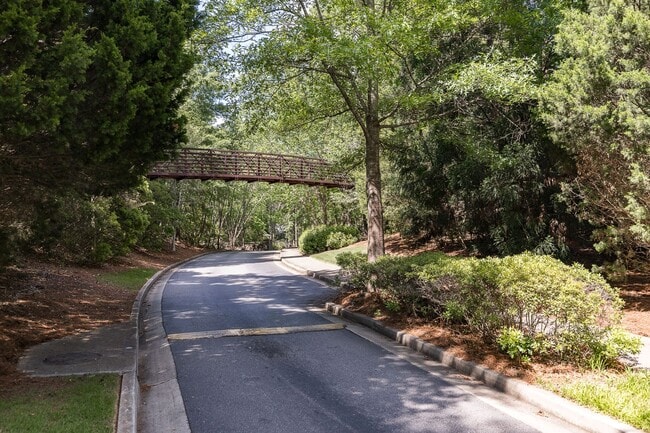 Building Photo - Ground-level, one-story condo in the highly sought-after gated community, The Woodlands of Athens!