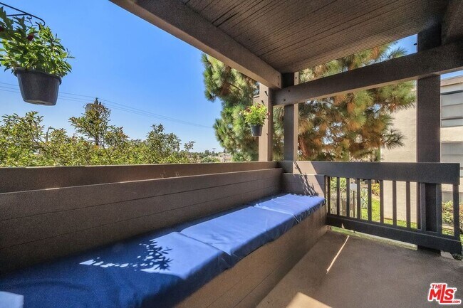 Building Photo - 8640 Gulana Ave