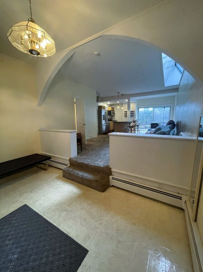 Building Photo - One Block to the Diag! Charming Home with Private Courtyard + Parking