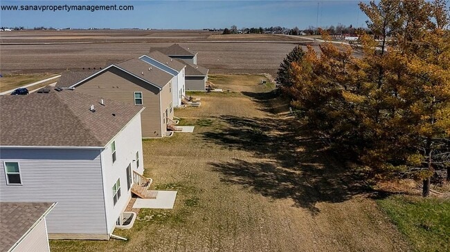 Building Photo - "Ankeny Oasis: Luxurious 4-Bedroom Home with Expansive 3-Car Garage and Secluded Backyard Retreat!"