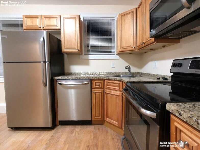 Building Photo - 6-8 Nashua St. Unit 2