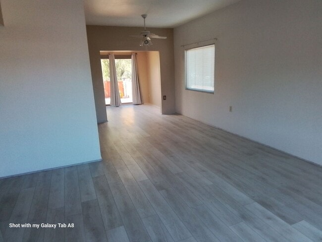 Building Photo - Unfurnished end unit townhome  55 and older community