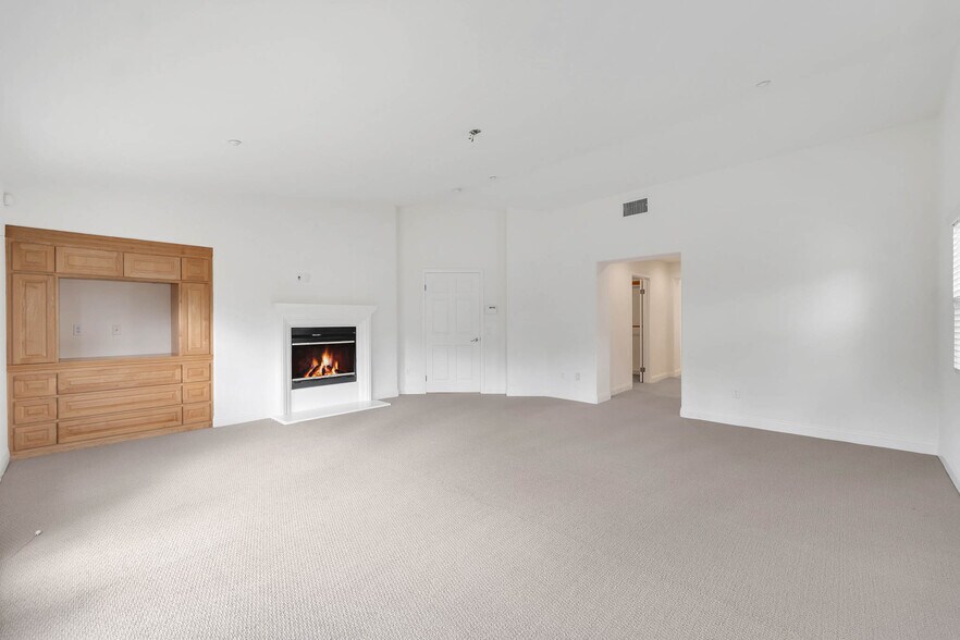 Primary Suite With Media Center & Fireplace - 12215 Delante Ct